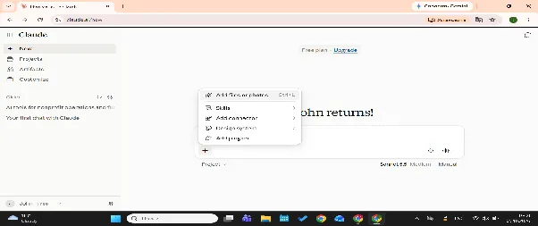 Claude message box plus menu showing Add files or photos, Skills, Add connector and other options